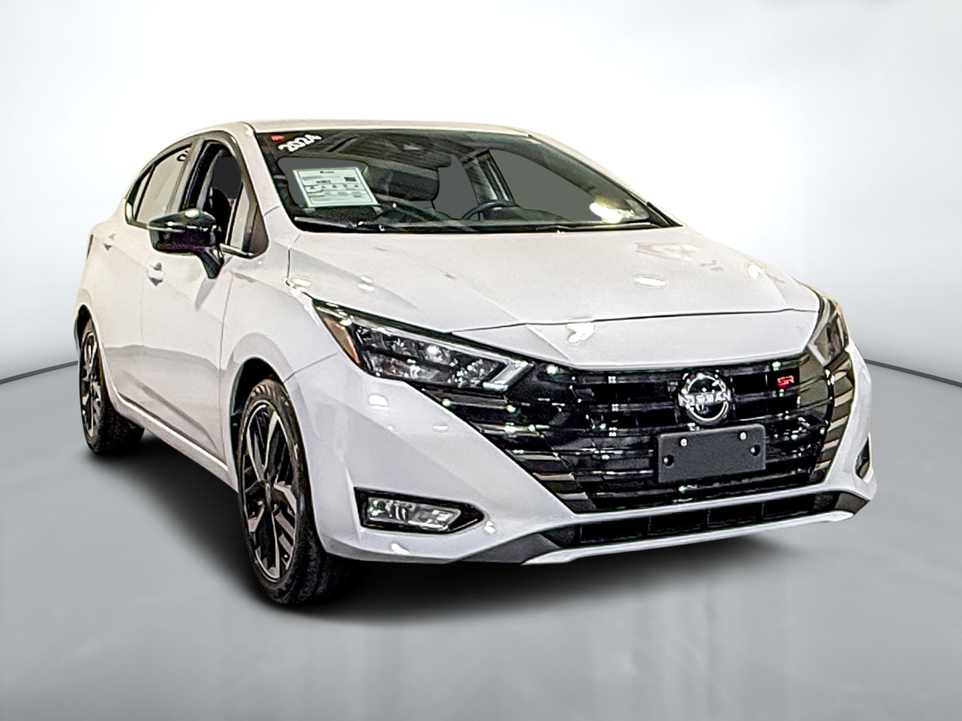 White 2024 Nissan Versa Sedan Front-Wheel Drive Automatic